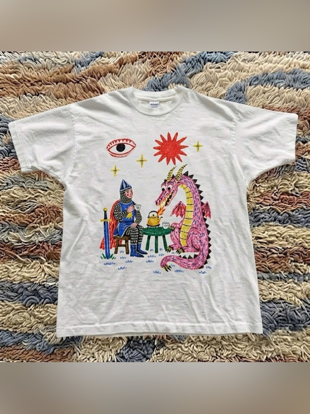 Vintage White Graphic Tee with Pink Dragon and Knight Illustration